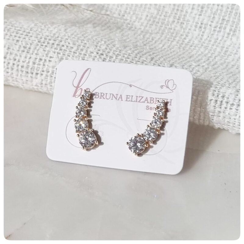 Brinco dourado ear cuff com zircônias